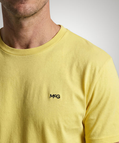 Essential MCG Embr T-Shirt | Light Yellow
